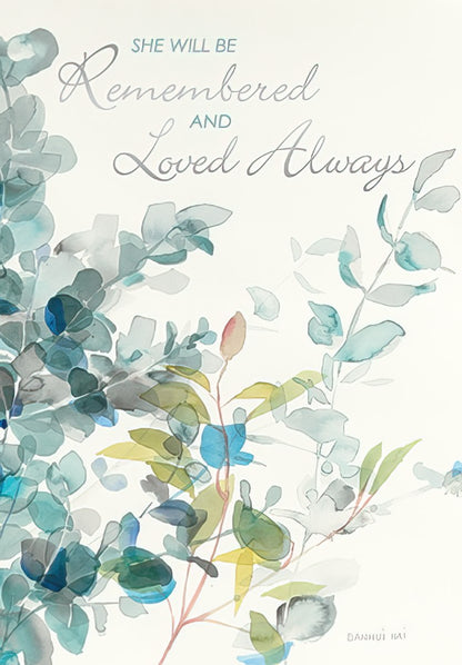 Front of a sympathy greeting card featuring watercolor eucalyptus leaves and the text "SHE WILL BE Remembered AND Loved Always".