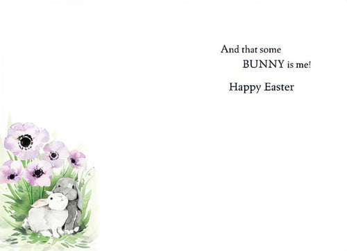 Inside of a heartwarming spring greeting card, showing a continuation of the watercolor bunnies and purple flowers in the bottom left, with the sweet message 'And that some BUNNY is me! Happy Easter' on a clean white background, ideal for conveying affection.