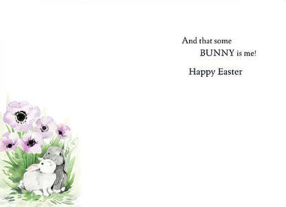 Inside of an Easter card with the same watercolor bunnies and flowers. Text reads 'And that some BUNNY is me! Happy Easter'.