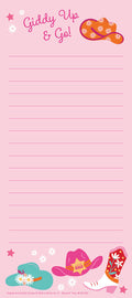 Pink magnetic listpad featuring 'Giddy Up & Go!' text in a playful font, decorated with an orange floral cowboy hat at the top. The bottom border showcases a teal floral sun hat, a pink 'Let's Go Girls' cowboy hat, and a red and white cowboy boot, all against a lined pink background for notes. The overall design is cheerful and western-themed.