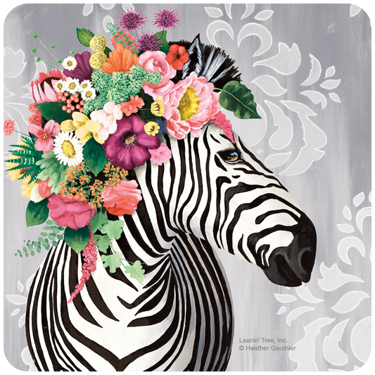 Greeting card featuring a stylish zebra with black and white stripes, adorned with a vibrant crown of pink, red, yellow, and purple wildflowers against a gray background.