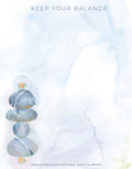 Serene watercolor notepad featuring balanced cairn stones and 'Keep Your Balance' text, perfect for mindfulness and organization.
