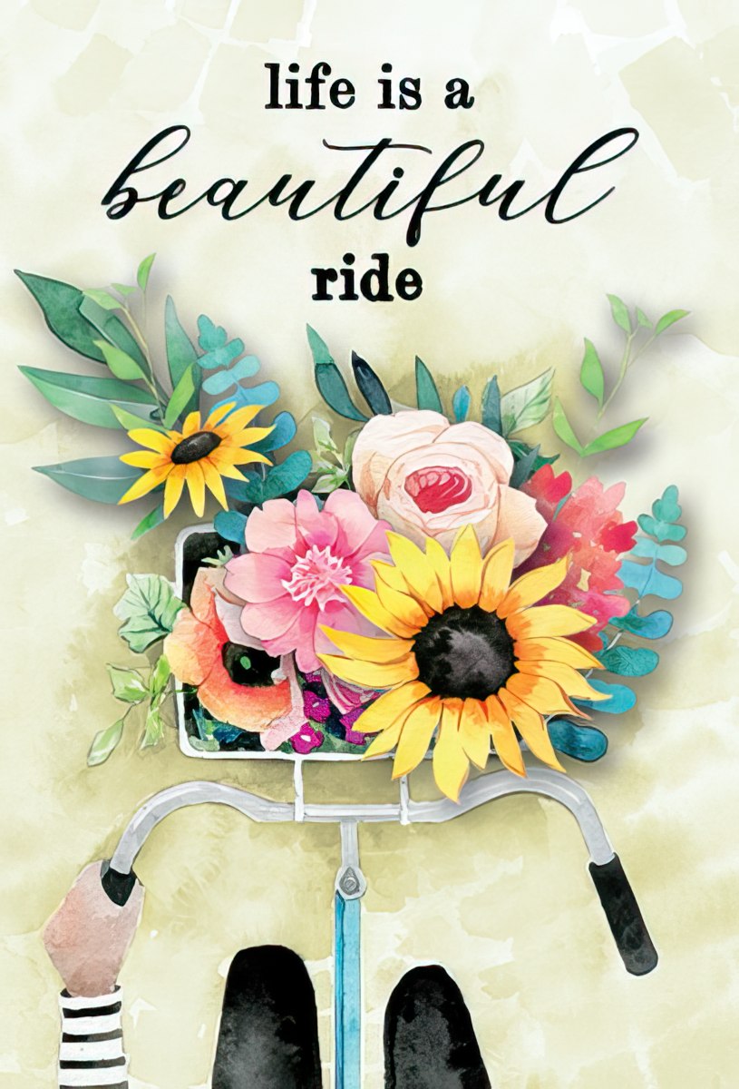 Flowers in a bike basket on bike