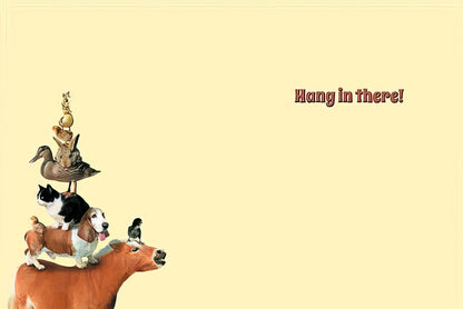 Inside of the stacked animals card, with a light yellow background and the simple message 'Hang in there!'.