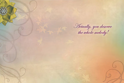 Interior of the 'note of thanks' card, with the message 'Actually, you deserve the whole melody!'