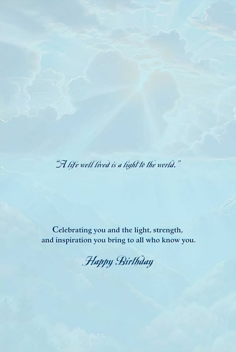 Inside of an eagle-themed greeting card, with an inspiring quote "A life well lived is a light to the world" and "Happy Birthday".