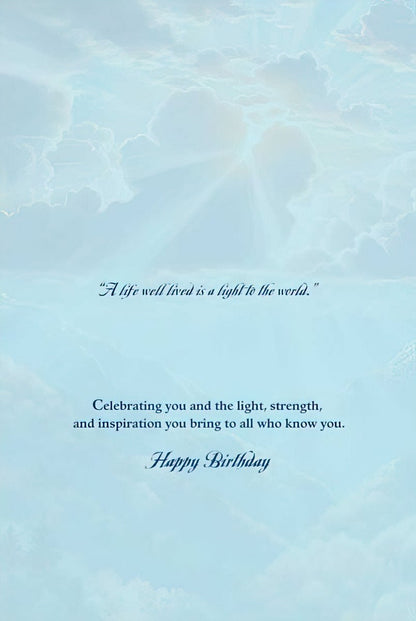 Inside of an eagle-themed greeting card, with an inspiring quote "A life well lived is a light to the world" and "Happy Birthday".