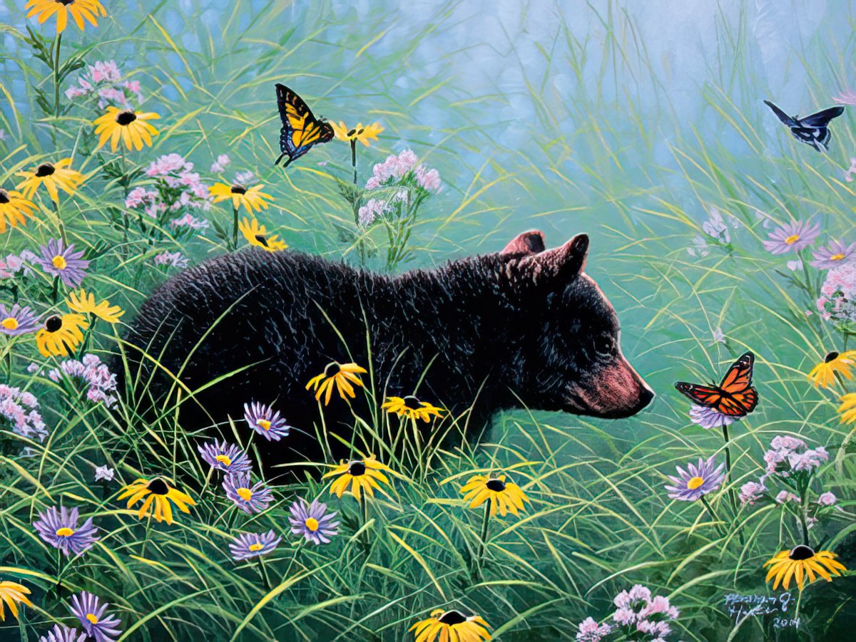 A curious black bear cub explores a colorful field of yellow and purple wildflowers, with monarch butterflies fluttering around.
