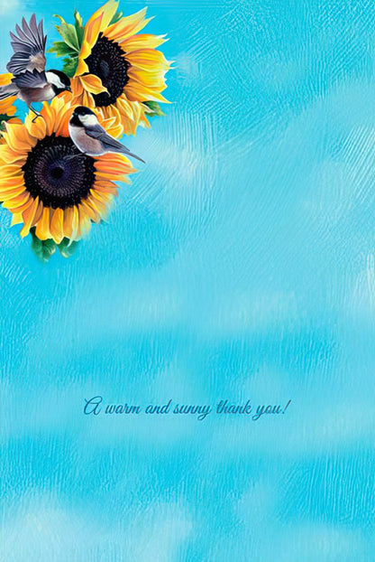 Inside view of a thank you greeting card featuring chickadees and sunflowers, with the message 'A warm and sunny thank you!'.
