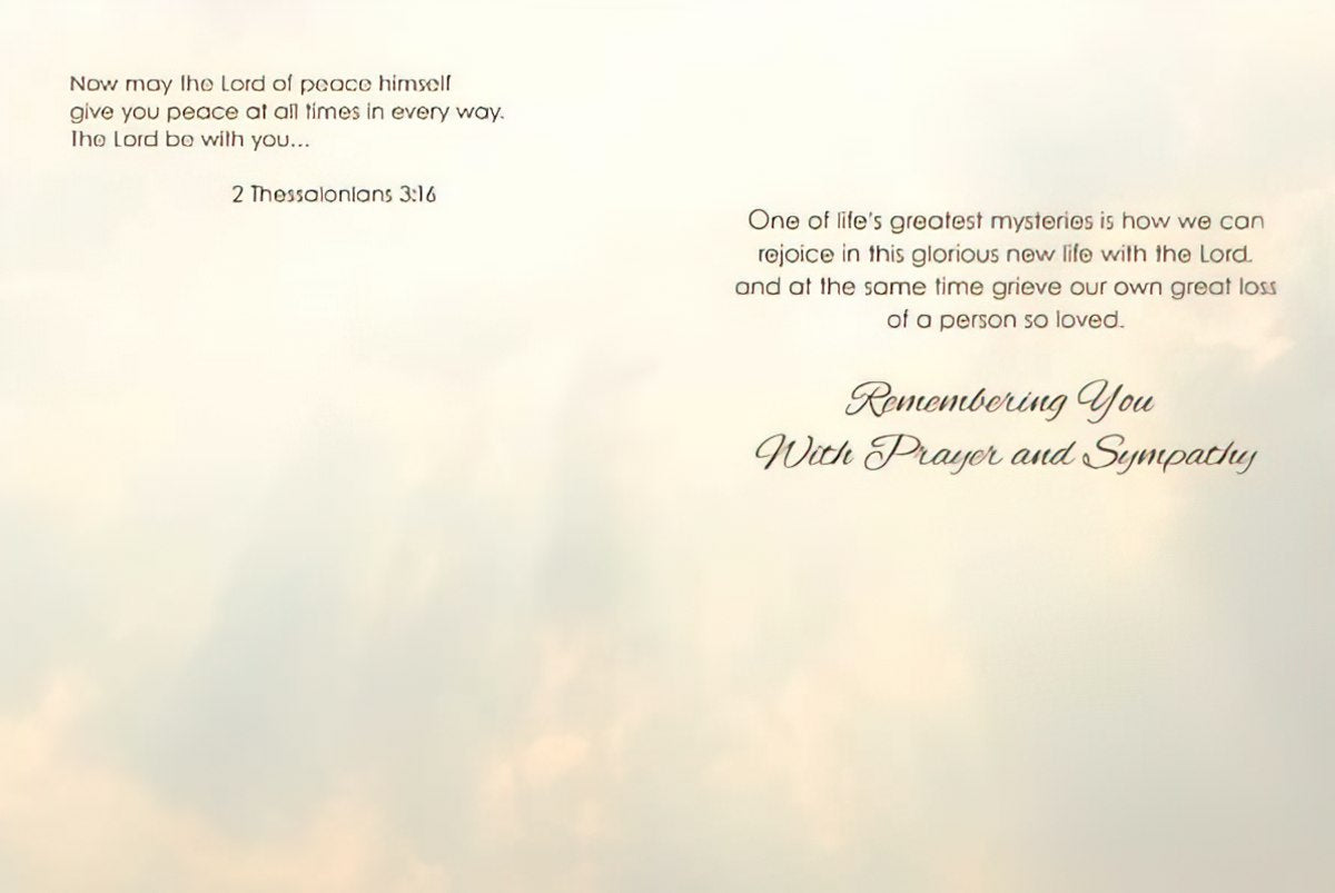 Inside of religious sympathy card showing scripture '2 Thessalonians 3:16' and message 'Remembering You With Prayer and Sympathy' against a soft cloud background.