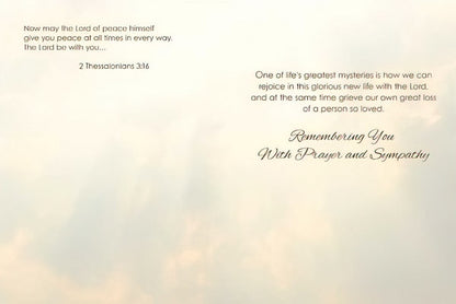 Inside of religious sympathy card showing scripture '2 Thessalonians 3:16' and message 'Remembering You With Prayer and Sympathy' against a soft cloud background.