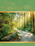 Front of a green Confirmation Day greeting card featuring golden script saying 'Sharing the Joy of Your Confirmation Day' above a serene forest path with sunlight filtering through trees, symbolizing a spiritual journey and growth.