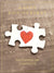 PUZZLE PIECES TOGETHER IN HEART SHAPE