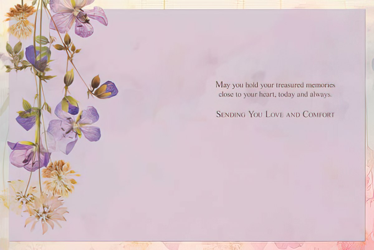 Interior of abstract flowers sympathy card with message about holding treasured memories close.