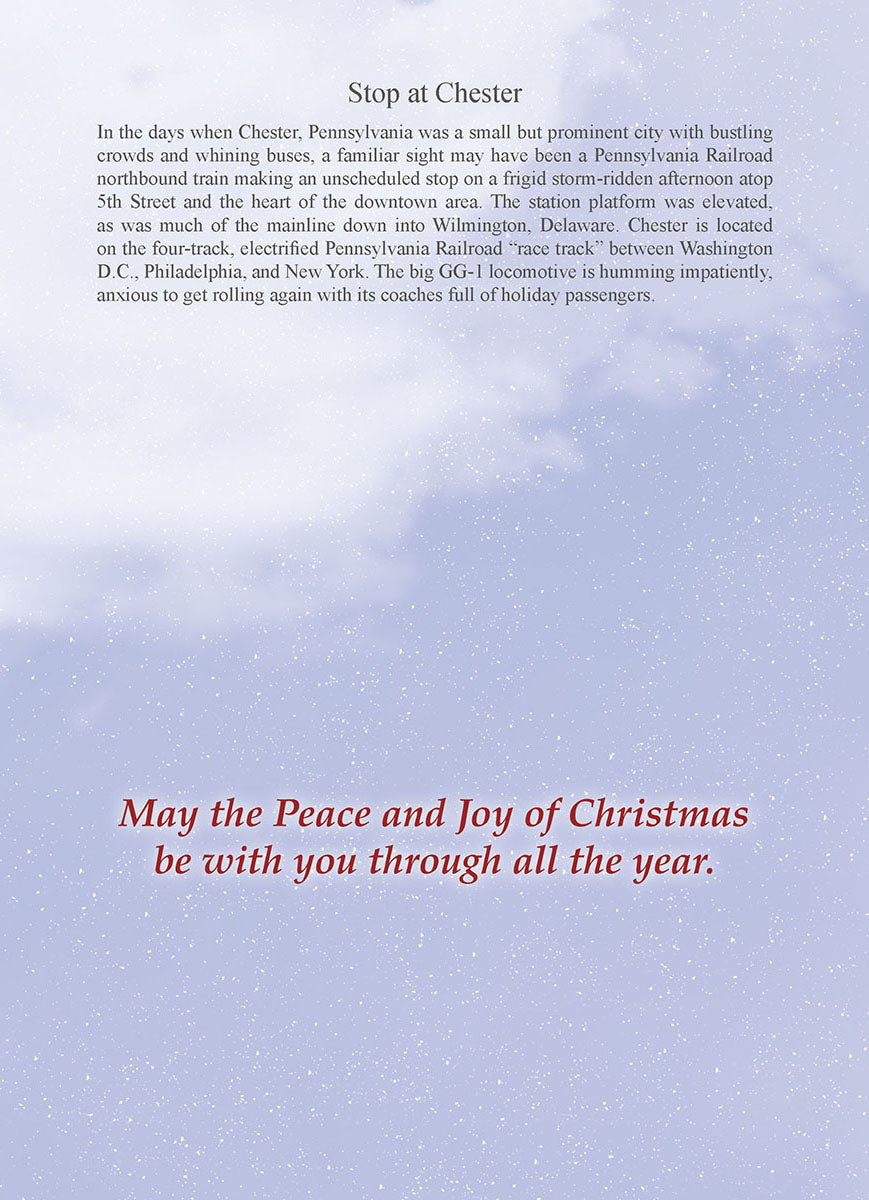 Inside of a holiday greeting card with a light blue background subtly patterned with delicate snowflakes. Centered on the card is the heartfelt message in a classic red script: 'May the Peace and Joy of Christmas be with you through all the year.'