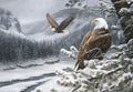 Front of a holiday greeting card featuring a majestic bald eagle perched on a snow-covered pine branch, overlooking a serene winter mountain valley with another eagle flying in the distance. The scene includes snow-laden pine trees and a frozen river, capturing a stunning winter wildlife landscape.