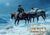 cowboy on horseback leading pack horse in snow under the christmas star