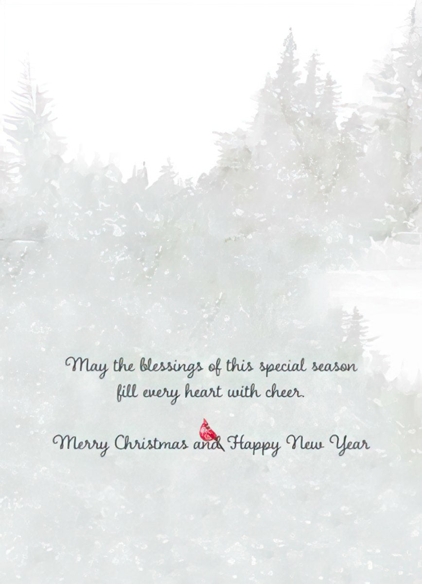 Inside of a religious holiday card with a subtle snowy tree background, featuring the heartfelt message: 'May the blessings of this special season fill every heart with cheer. Merry Christmas and Happy New Year,' accompanied by a small red cardinal.