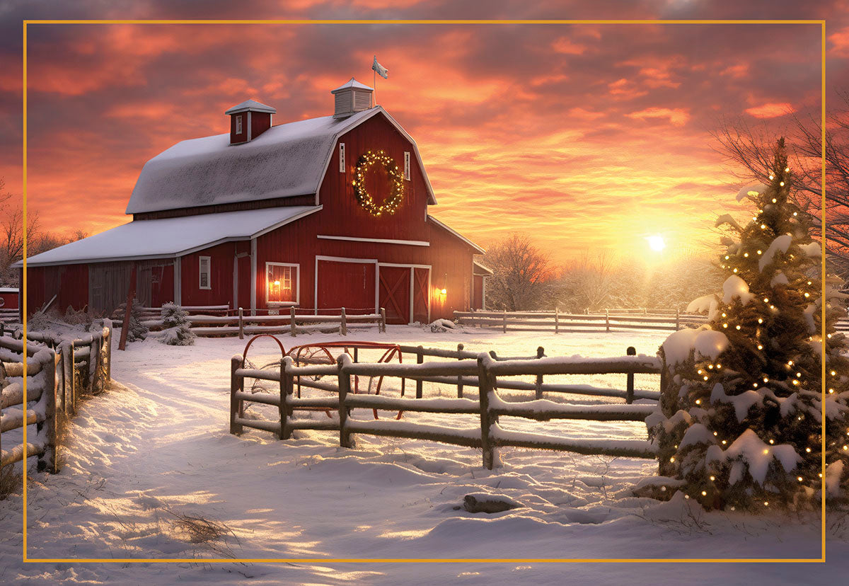 Snow-covered red barn under a vibrant sunset with a lighted wreath and Christmas tree, showcasing a festive winter farm scene.
