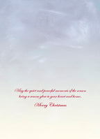 Interior of a greeting card with elegant red script on a soft blue and white gradient background, reading: 'May the quiet and peaceful moments of the season bring a warm glow to your heart and home. Merry Christmas.'