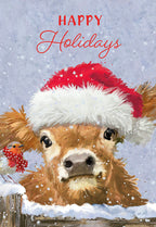 Adorable calf wearing a festive red Santa hat with a fluffy white trim, peeking over a snow-covered wooden fence, next to a small robin bird in a red scarf, with falling snowflakes on a light blue background. Happy Holidays text prominently displayed.