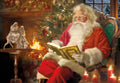 Jolly Santa Claus in a red suit with a white beard, spectacles, and fur trim, sitting in an armchair by a warm fireplace reading a 'Holy Bible' while a decorated evergreen tree and a miniature nativity scene are visible in the background, conveying a traditional religious holiday scene.