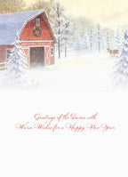 Inside of a holiday greeting card featuring elegant red script text 'Greetings of the Season with Warm Wishes for a Happy New Year' on a soft white background.