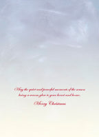Inside view of a peaceful holiday greeting card with elegant red script: 'May the quiet and peaceful moments of the season bring a warm glow to your heart and home. Merry Christmas'.