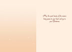 Inside view of a heartfelt seasonal greeting card, featuring a soft peach gradient background and the elegant script message: 'May the quiet beauty of the season bring peace to your heart and joy to your Christmas.'