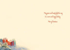 Inside of a heartfelt greeting card displaying elegant red script: 'May peace and beauty light the way to a warm and happy holiday. Merry Christmas.' against a soft, snowy background with subtle gifts.