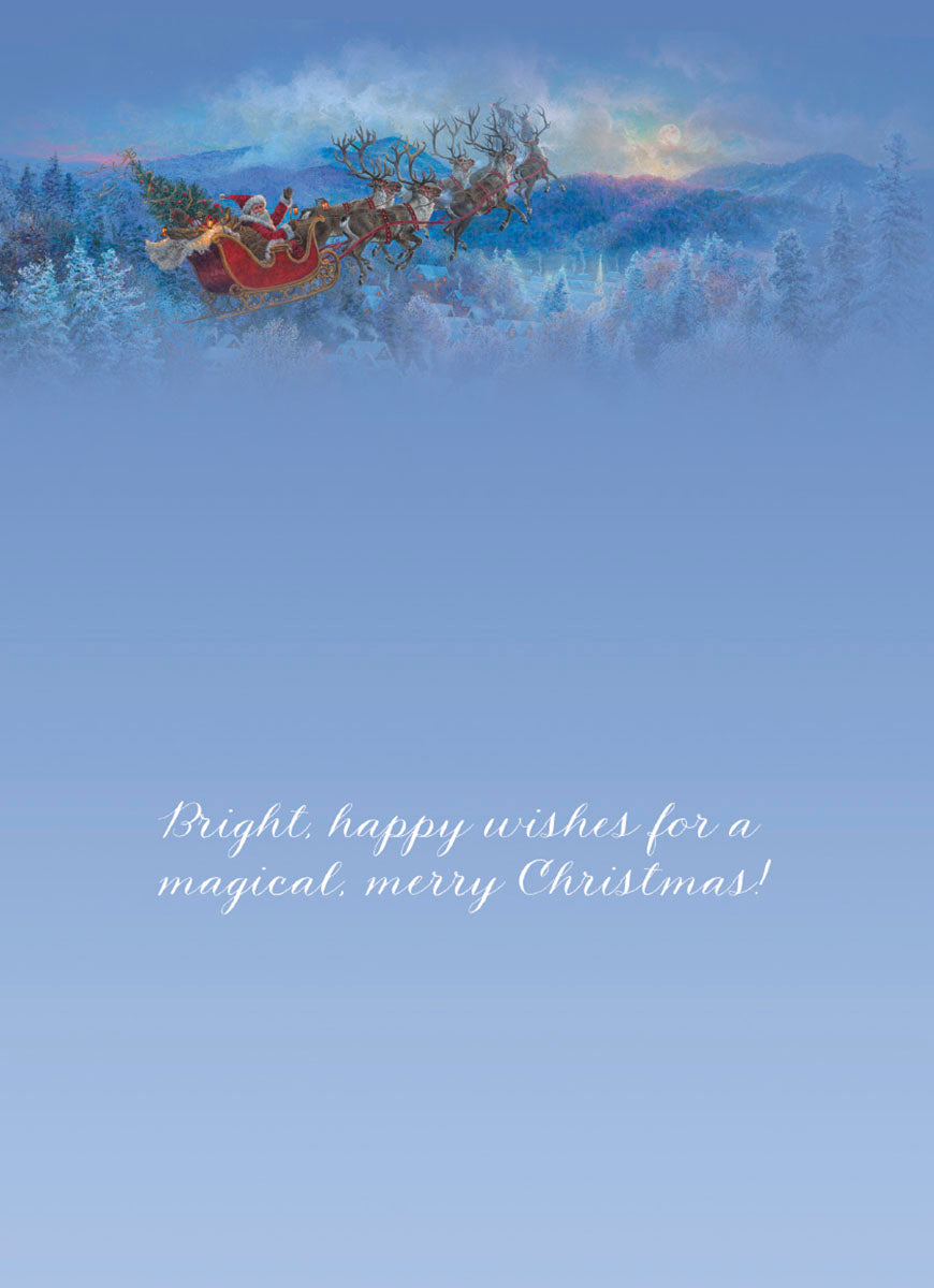 Inside of a holiday greeting card featuring a faded magical winter village scene with Santa's sleigh at the top, and the heartfelt message 'Bright, happy wishes for a magical, merry Christmas!' written in elegant script on a blue background.