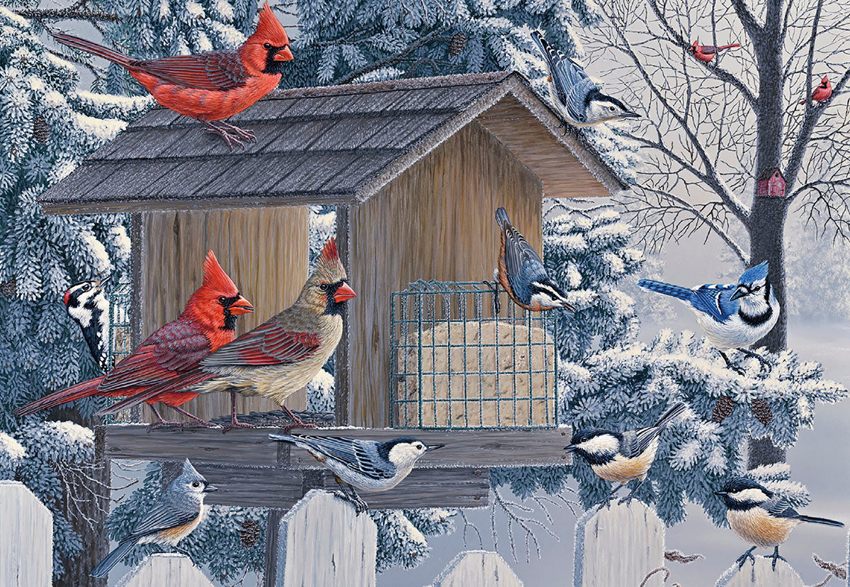 Vibrant red cardinals, blue jays, nuthatches, and chickadees gather at a snowy wooden bird feeder amidst frosted evergreen trees and a white picket fence, capturing a serene winter wildlife scene.