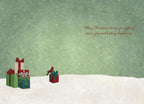 Inside of a heartwarming holiday greeting card displaying a serene green background with gentle falling snow. Three wrapped presents, one red and two green, are neatly stacked on the left, with a single red gift box and a cardinal on the right. Elegant script wishes 'May Christmas bring you gifts of peace, joy and lasting happiness,' making it perfect for spreading seasonal cheer.