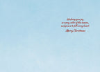 Inside of a light blue greeting card featuring a heartfelt red script message: 'Wishing you joy in every color of the season, and peace to fill every heart. Merry Christmas.' Ideal for warm seasonal greetings.
