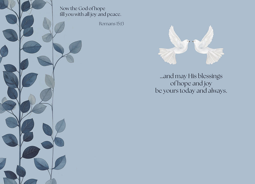 Inside a religious holiday card with two white doves, blue leafy branches, and scripture text 'Romans 15:13: Now the God of hope fill you with all joy and peace' and '...and may His blessings of hope and joy be yours today and always'.