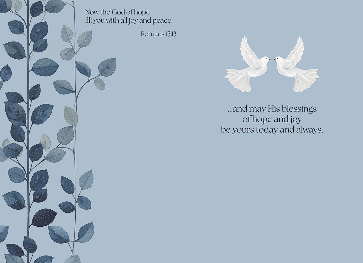 Inside a religious holiday card with two white doves, blue leafy branches, and scripture text 'Romans 15:13: Now the God of hope fill you with all joy and peace' and '...and may His blessings of hope and joy be yours today and always'.