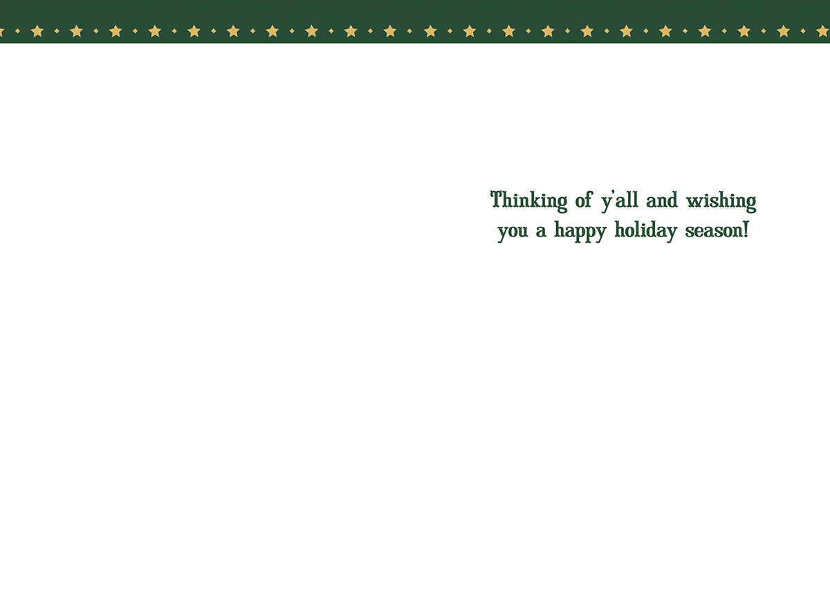 Inside view of a Howdy Doo Season greeting card with a simple white background and a green starry border at the top. The message reads 'Thinking of y'all and wishing you a happy holiday season!'