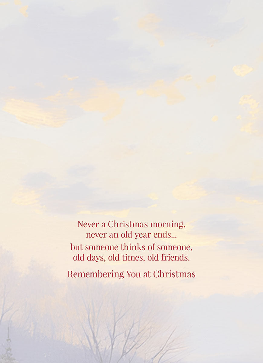 Close-up of a greeting card interior with the heartfelt text: "Never a Christmas morning, never an old year ends... but someone thinks of someone, old days, old times, old friends. Remembering You at Christmas" against a soft, light background.