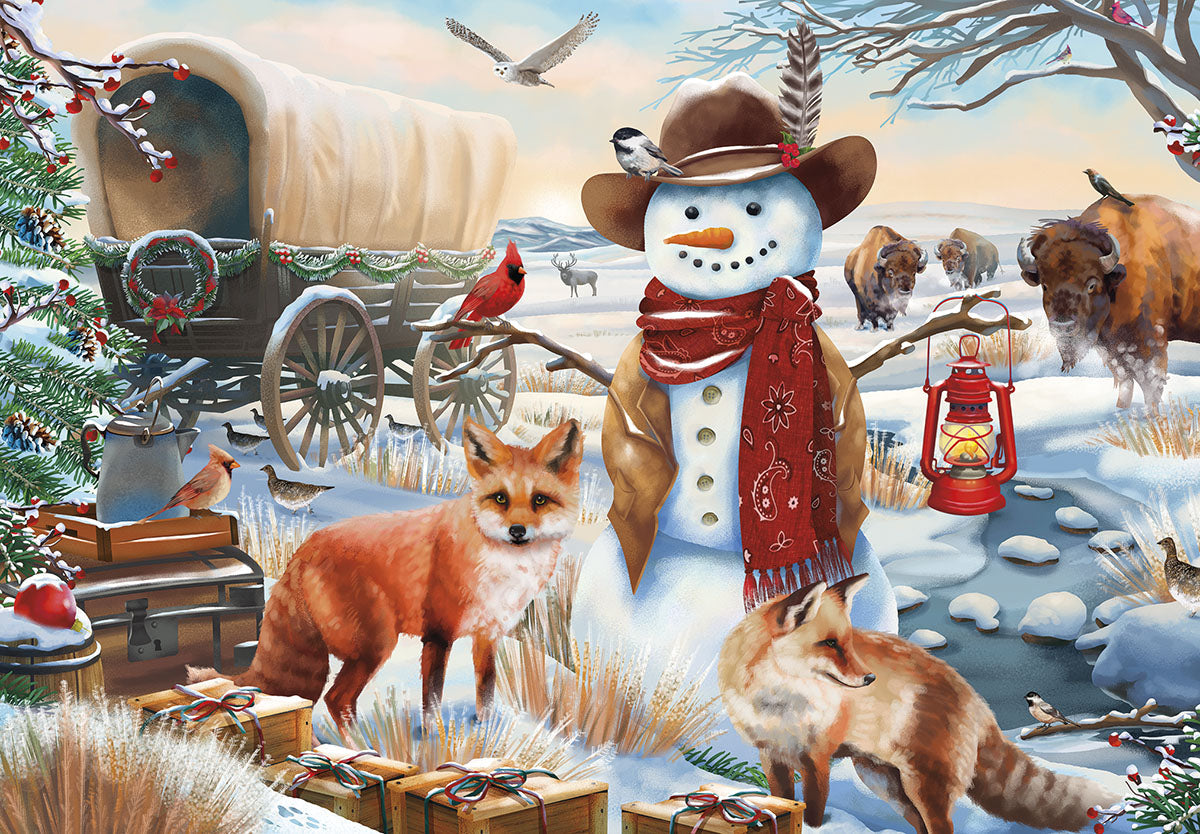 Front of a cute Christmas greeting card featuring a snowy winter wonderland scene with a festive snowman, two red foxes, majestic bison, a red cardinal, and a vintage covered wagon decorated for the holidays. Wrapped gifts are visible in the foreground.