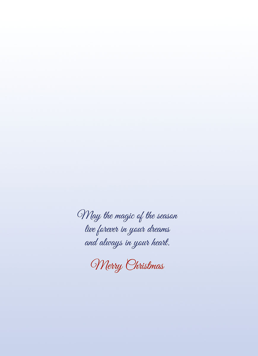 Interior of a heartfelt holiday card with elegant script wishing 'May the magic of the season live forever in your dreams and always in your heart. Merry Christmas.'