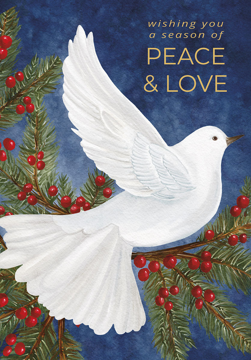 Elegant religious holiday greeting card featuring a watercolor white dove soaring amidst festive evergreen pine branches adorned with vibrant red berries against a deep blue background. Gold foil text reads 'wishing you a season of PEACE & LOVE'.