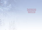 Inside of a holiday greeting card with a serene snowy background and heartfelt message: 'May the Season's spirit and the Christmas star shine down on you wherever you are!'