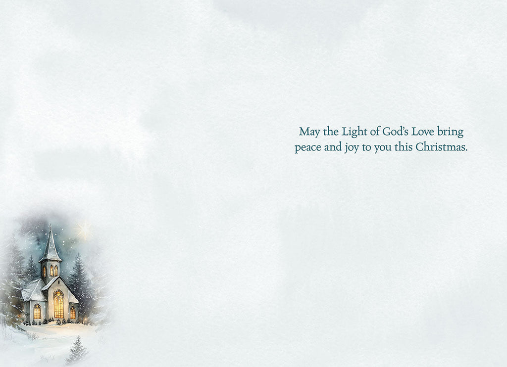Interior of a religious Christmas greeting card with a serene light blue background, a small vignette of a snowy church scene on the left, and elegant text on the right: 'May the Light of God's Love bring peace and joy to you this Christmas.'