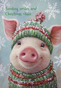 Adorable smiling pig in a festive red and green knitted hat and scarf, covered in snowflakes, conveying holiday cheer. Front of a cute winter greeting card.