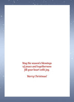 Inside of a heartfelt holiday greeting card displaying the message: 'May the season's blessings of peace and togetherness fill your heart with joy. Merry Christmas!'