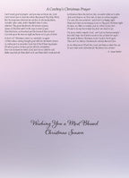 Inside view of the 'Prairie Star Hope' greeting card displaying the full 'A Cowboy's Christmas Prayer' poem by S. Ontar Barker on a soft gradient background, along with a 'Wishing You a Most Blessed Christmas Season' message, ready for personal inscription.