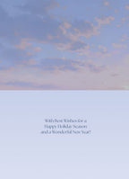 Inside of a holiday greeting card with a soft blue sky background, featuring the warm message: 'With Best Wishes for a Happy Holiday Season and a Wonderful New Year!'.