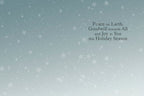 Inside of a holiday greeting card featuring a serene blue-grey background with delicate white snowflakes, and the heartfelt message 'Peace on Earth, Goodwill towards All and Joy to You this Holiday Season' elegantly printed.