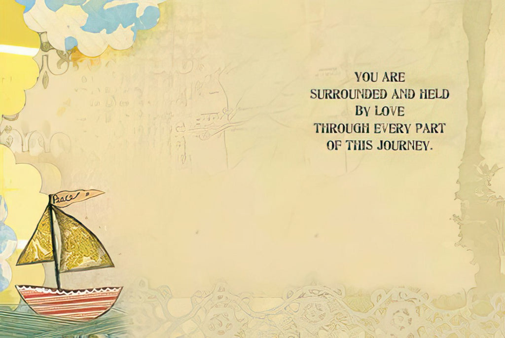 Inside view of an inspirational greeting card with a small sailboat illustration. Text reads: 'YOU ARE SURROUNDED AND HELD BY LOVE THROUGH EVERY PART OF THIS JOURNEY.' Ideal for sending heartfelt support.