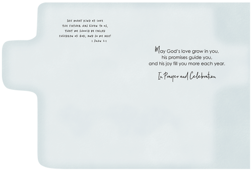 Inside view of a religious baptism greeting card with a light blue background. Features Bible verse 1 John 3:1 and a heartfelt message: 'May God's love grow in you, his promises guide you, and his joy fill you more each year. In Prayer and Celebration.' for a special child.